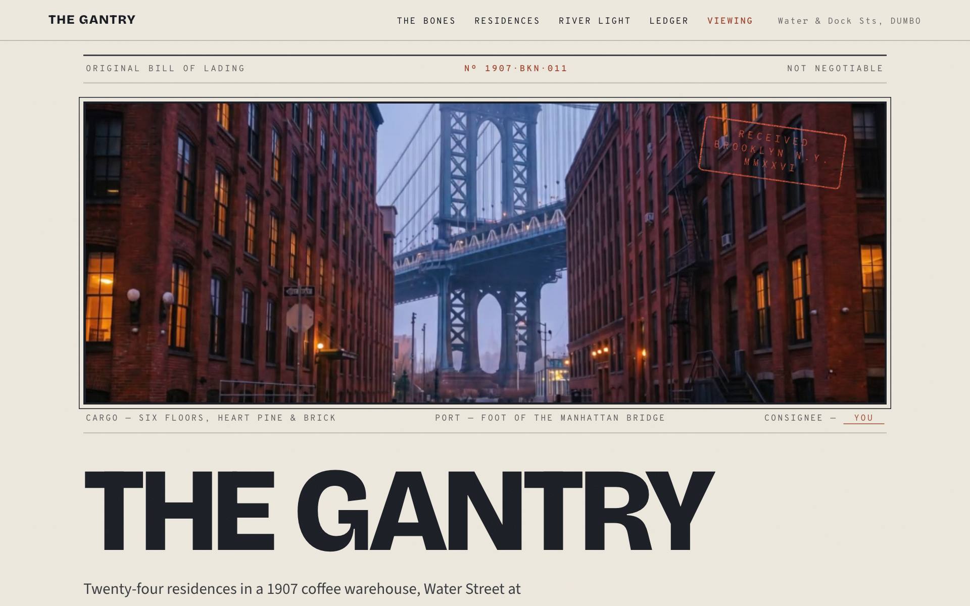 The Gantry — Manhattan Bridge framed by brick warehouses at blue hour